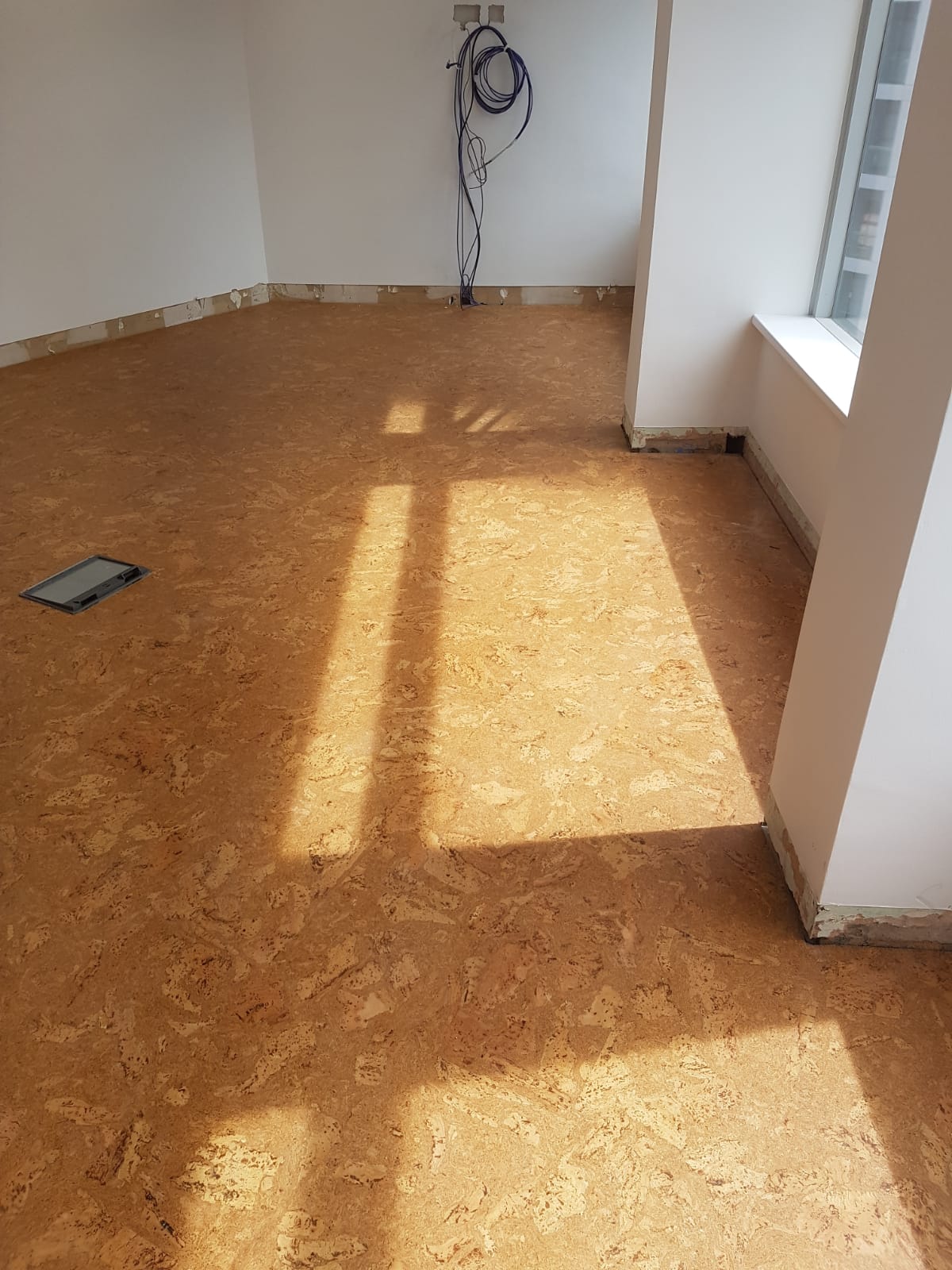Granorte cork flooring to a Alpha Tower in Birmingham Mazon Flooring